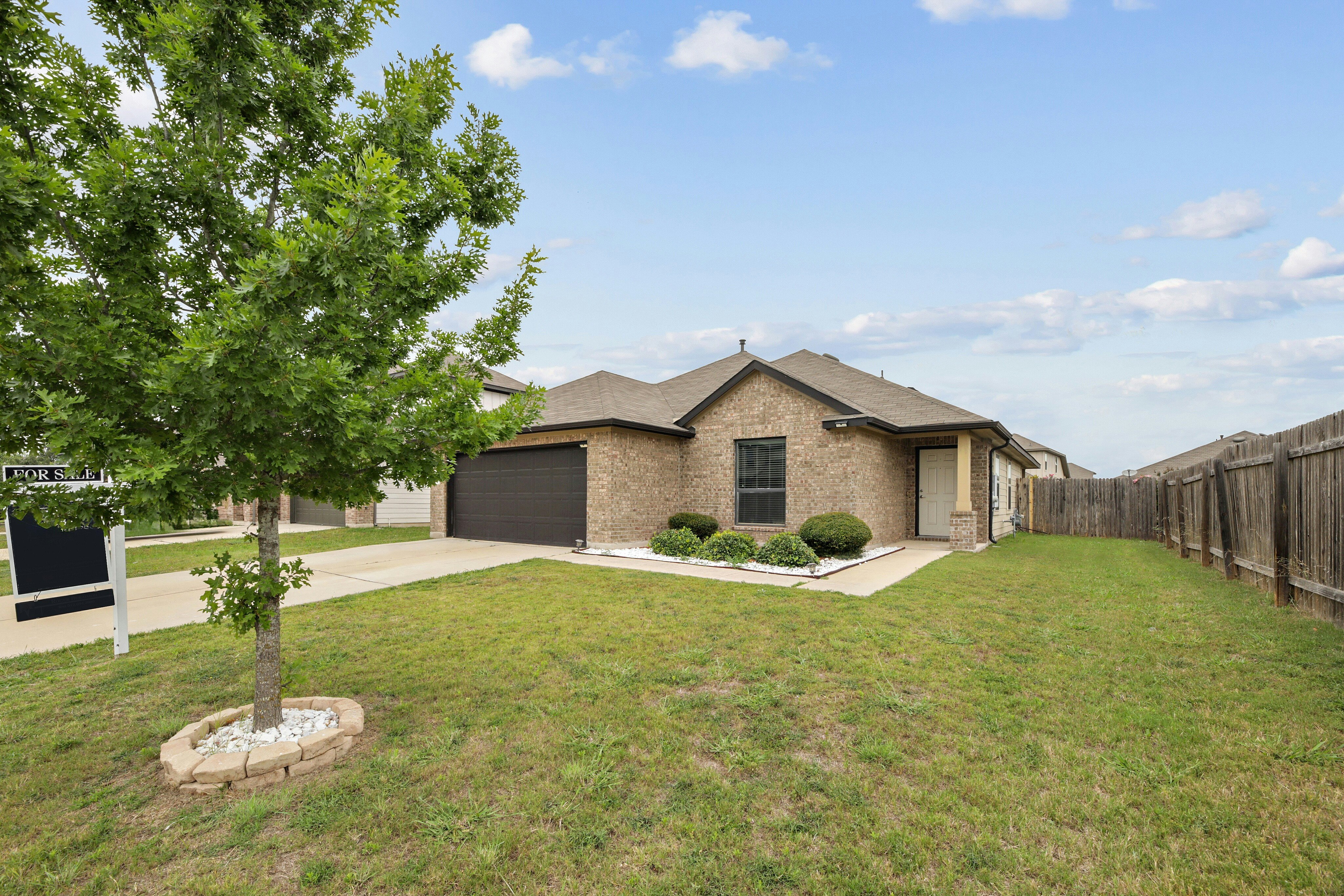 185 Diamondback Cove, Buda, TX 78610, Presented by Roger Buraimoh